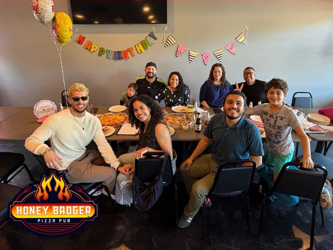 A birthday party around a long table